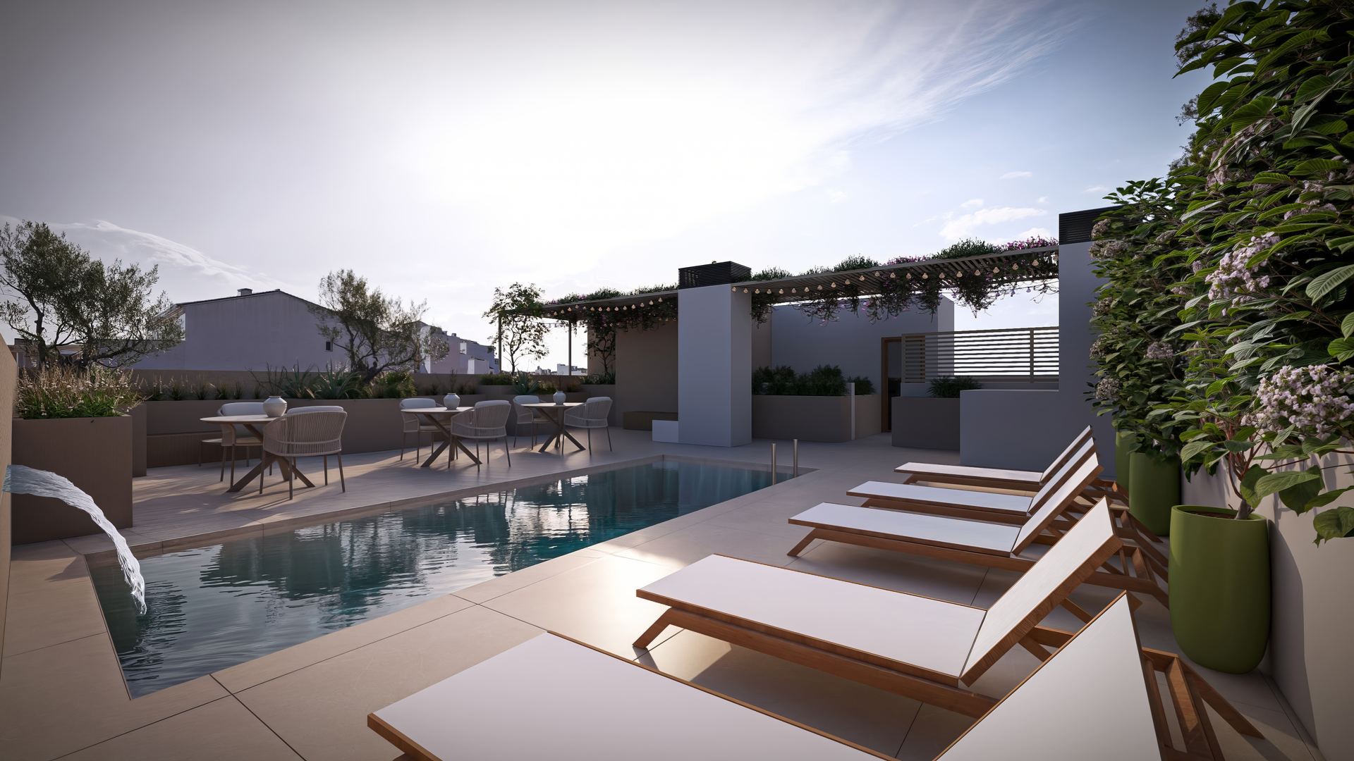 Rooftop with pool and sun loungers at the Bisbe Maura coliving