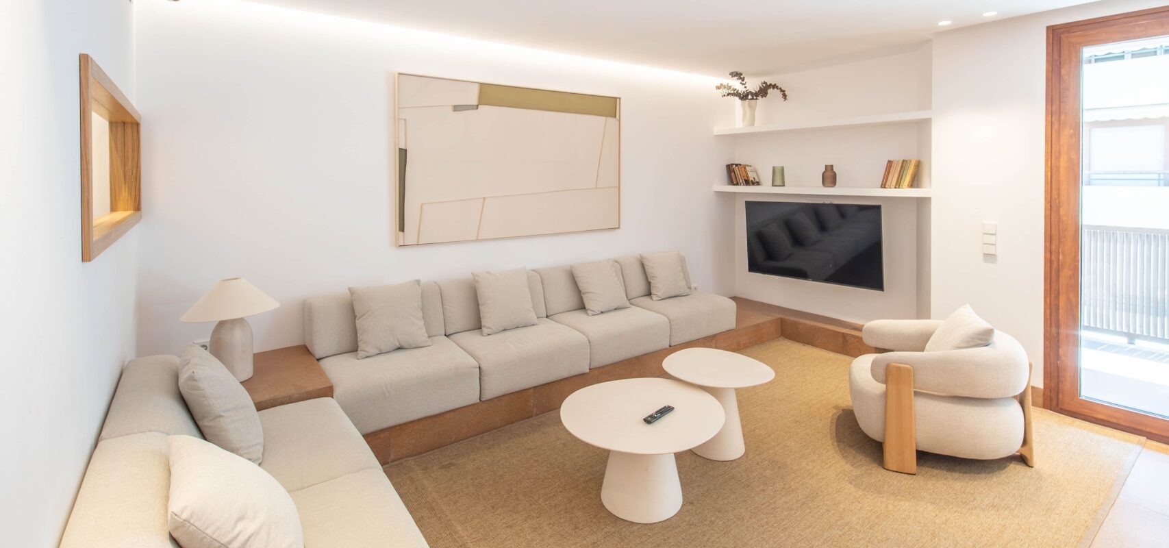 Shared living room with sofa and lounge area — Jaume Ferran building